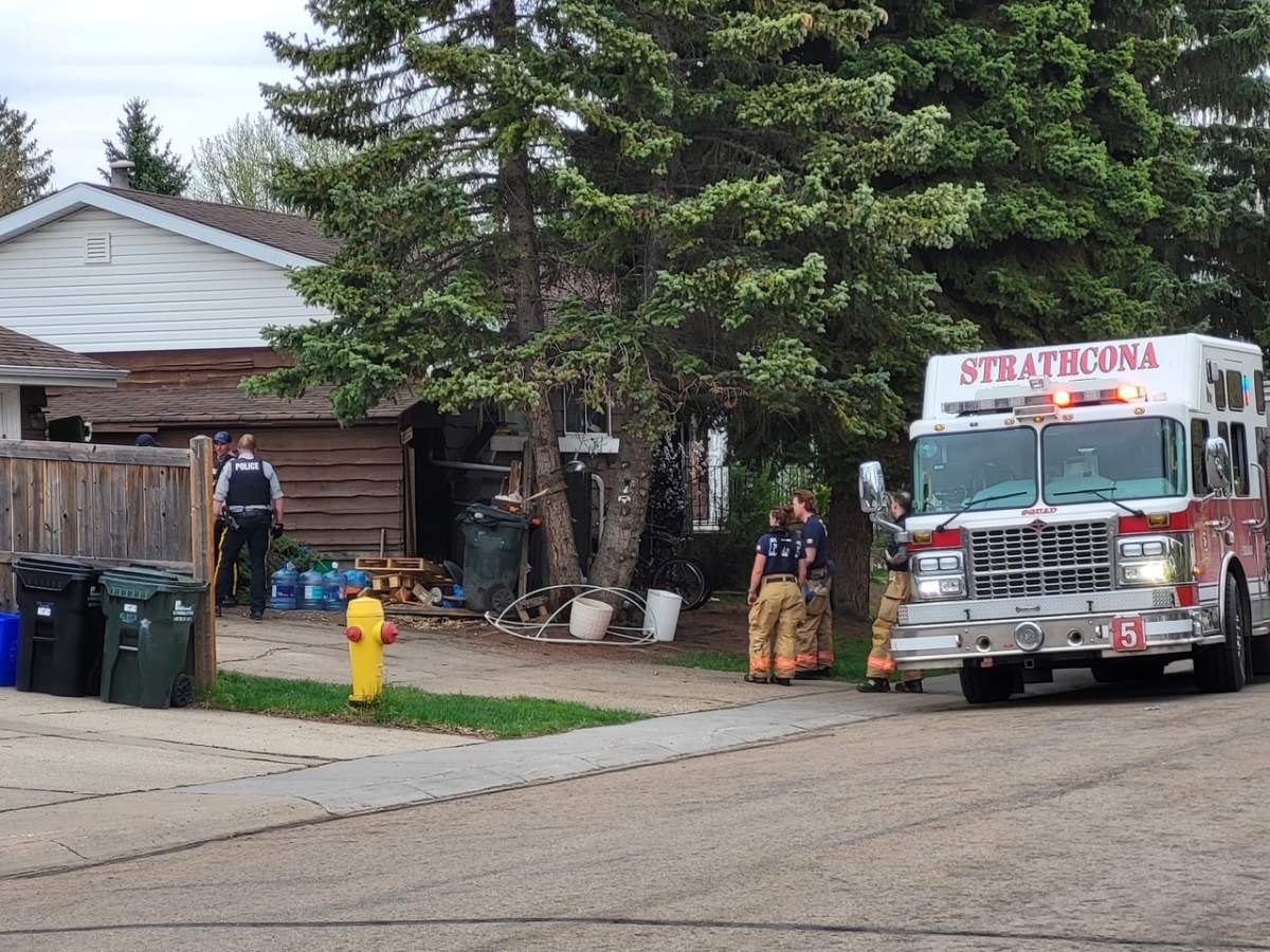 Strathcona County RCMP and firefighters responding to a blaze at 58 Glengarry Crescent in Sherwood Park, Alta. on Sunday, Aug. 9, 2026.