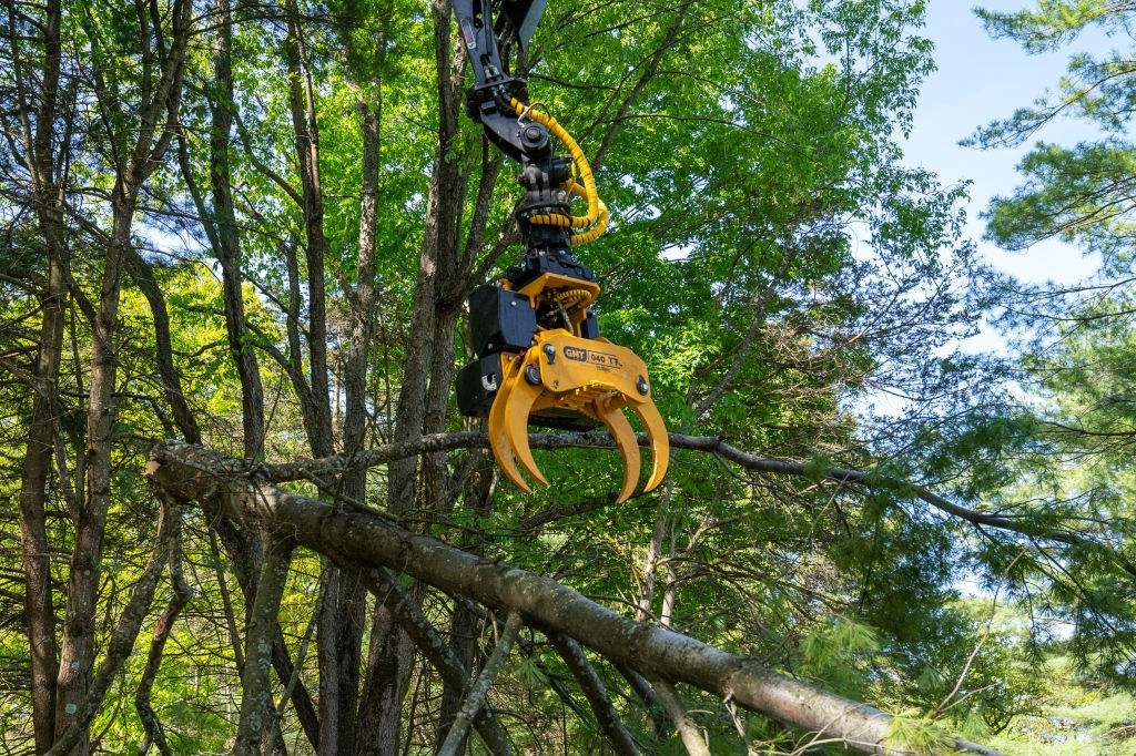 A file photo of a work crew with Teachers Tree Service uses an Effer grapple saw to remove a tree May 18, 2023 from a residential property in Charlotte, Vermont.