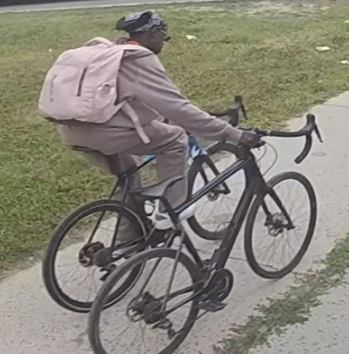 The Winnipeg Police Service shared three pictures of a person of interest in connection to a downtown bike theft in late July.