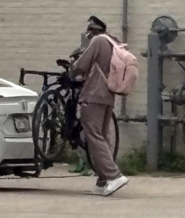 The Winnipeg Police Service shared three pictures of a person of interest in connection to a downtown bike theft in late July.