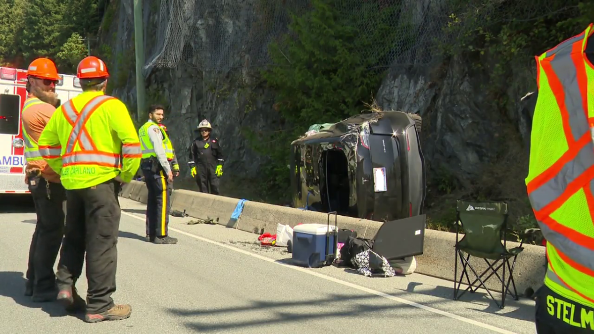 The Tesla ended up on its side on the side of the Sea to Sky Highway.