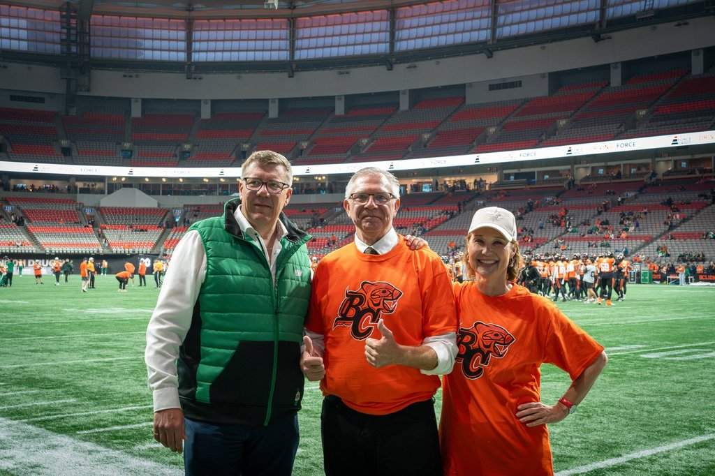 B.C. Conservative Party interim leader Lorne Doerkson, centre, meets with former B.C. Liberal Party leader and former premier Christy Clark and Saskatchewan Premier Scott Moe during a CFL football game between the B.C. Lions and Saskatchewan Roughriders, in Vancouver in a Friday, Sept. 26, 2026, handout photo. THE CANADIAN PRESS/Handout — B.C. Conservative Party (Mandatory Credit).