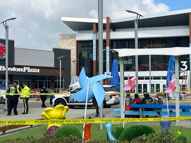 Police tape and emergency services on the scene at Tsawwassen Mills Mall in Delta on Wednesday morning.