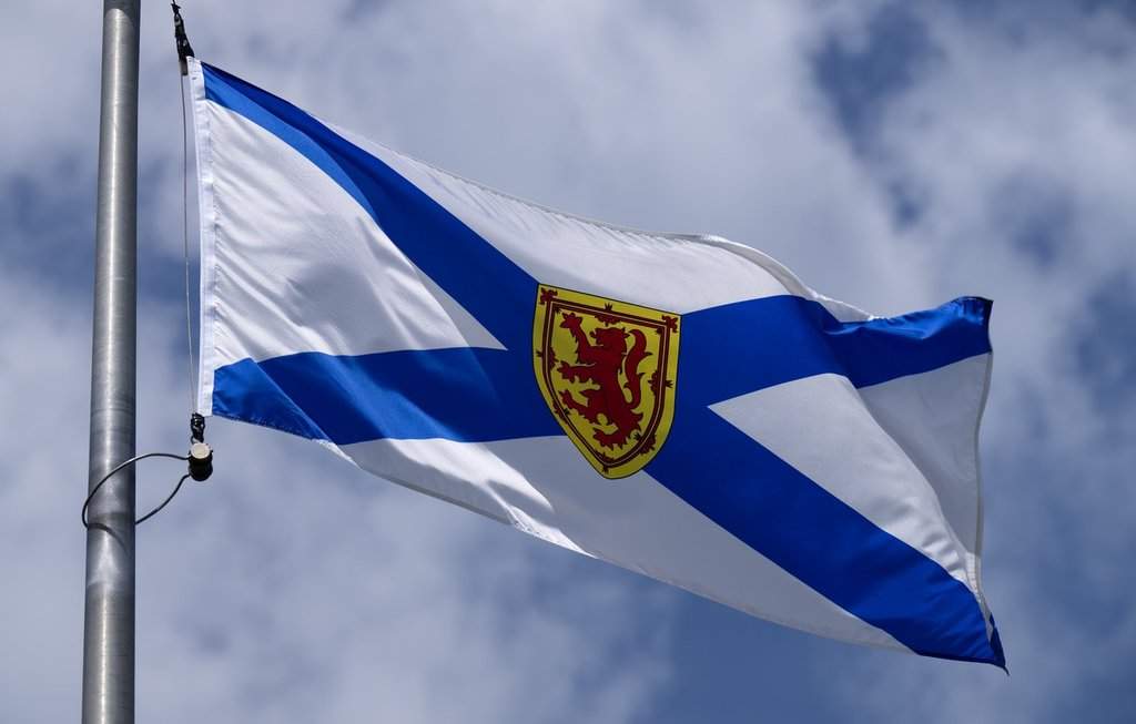 The Nova Scotia provincial flag flies on a flag pole in Ottawa, Thursday, July 23, 2026 in Ottawa.  THE CANADIAN PRESS/Adrian Wyld.