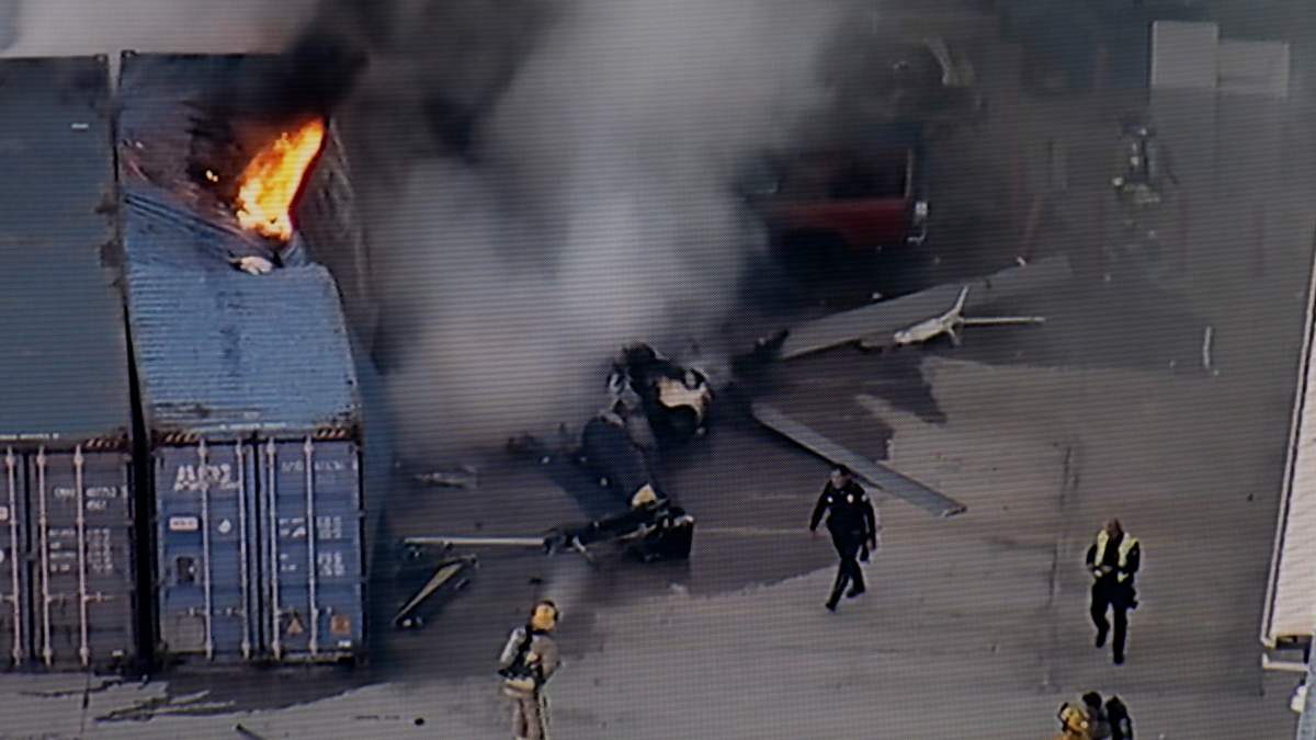 Helicopter crashes and bursts into flames, killing at least 3 people near an LA bus collision