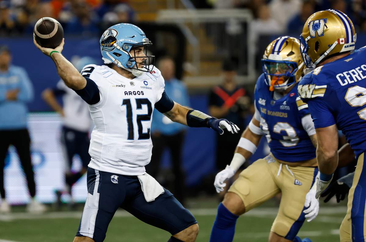 Toronto Argonauts quarterback Chad Kelly (12) throws against the Winnipeg Blue Bombers during first half CFL football action in Winnipeg on Friday, Sept. 25, 2026. THE CANADIAN PRESS/John Woods.