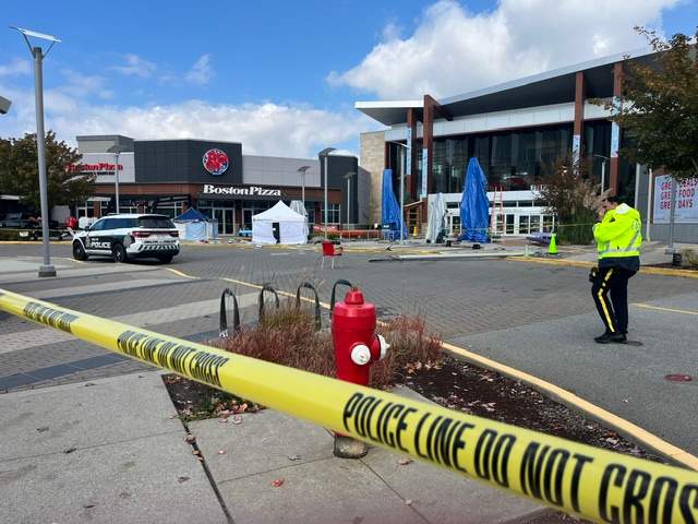 Police tape and emergency services on the scene at Tsawwassen Mills Mall in Delta on Wednesday morning.