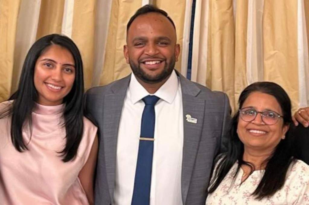 Ishan Patel, centre, poses with his wife Akanksha Patel, left, and his mother, Shilpa Patel in this undated handout photo.