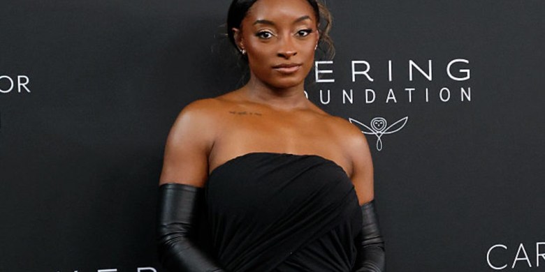 Simone Biles says 3 masked men broke into her Chicago home, stole Porsche