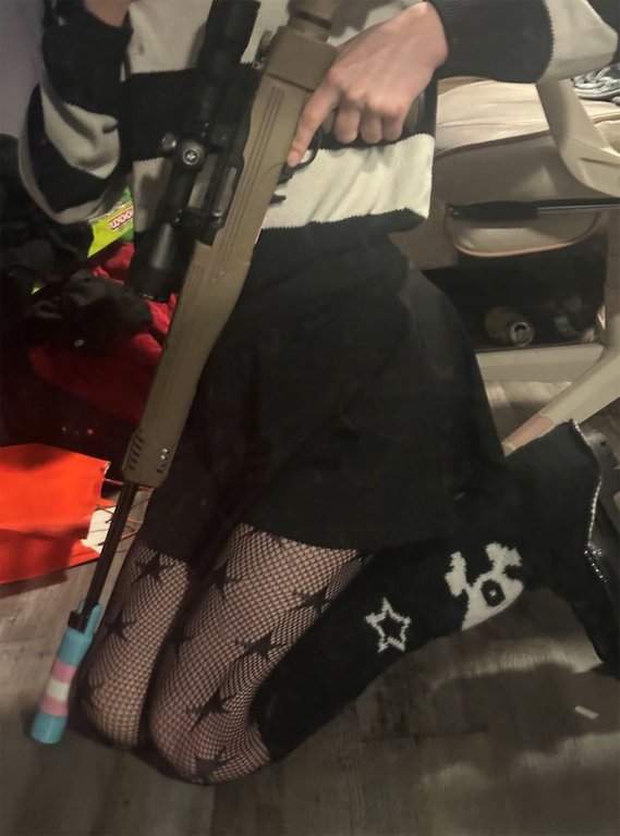 A person alleged to be Jesse Van Rootselaar is seen posing with a weapon in this Feb. 10, 2026, photo that was sent to James Bryant.