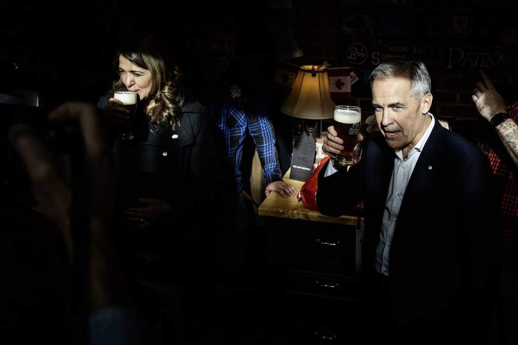 Prime Minister Mark Carney attends a national unity rally in Red Deer alongside Alberta Premier Danielle Smith on Friday, Oct. 16, 2026.