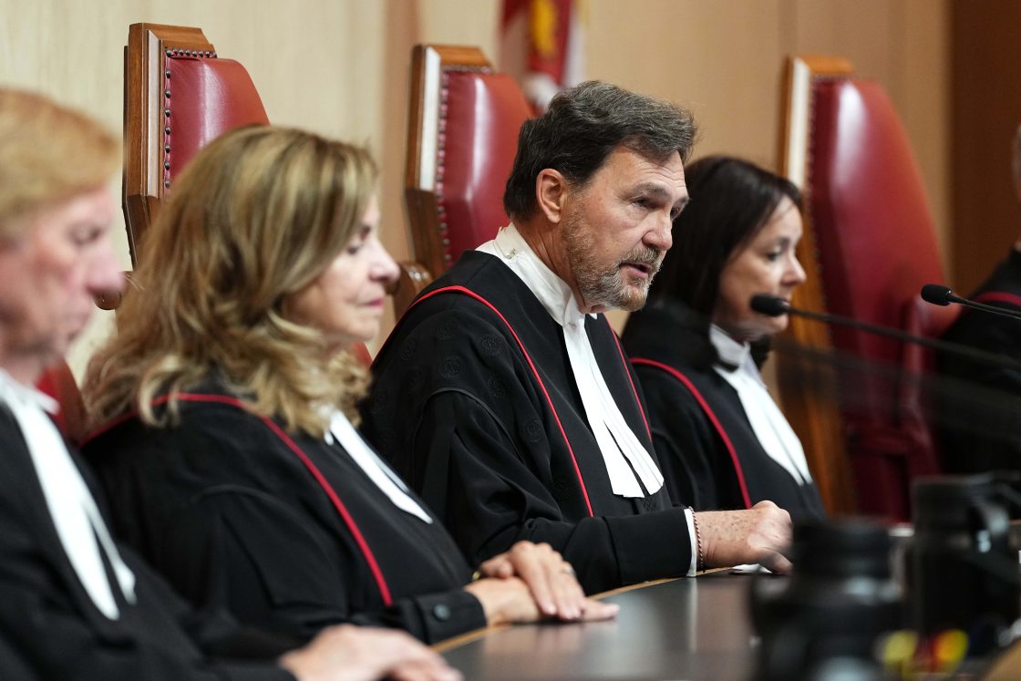 Chief justice says democratic institutions must be protected