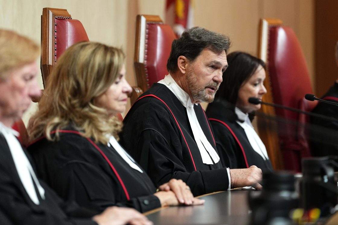 Chief justice says democratic institutions must be protected