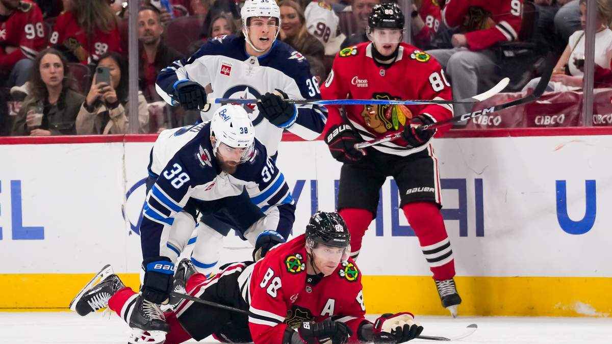 Winnipeg Jets rally from two goals down before losing in overtime 4-3 in Chicago