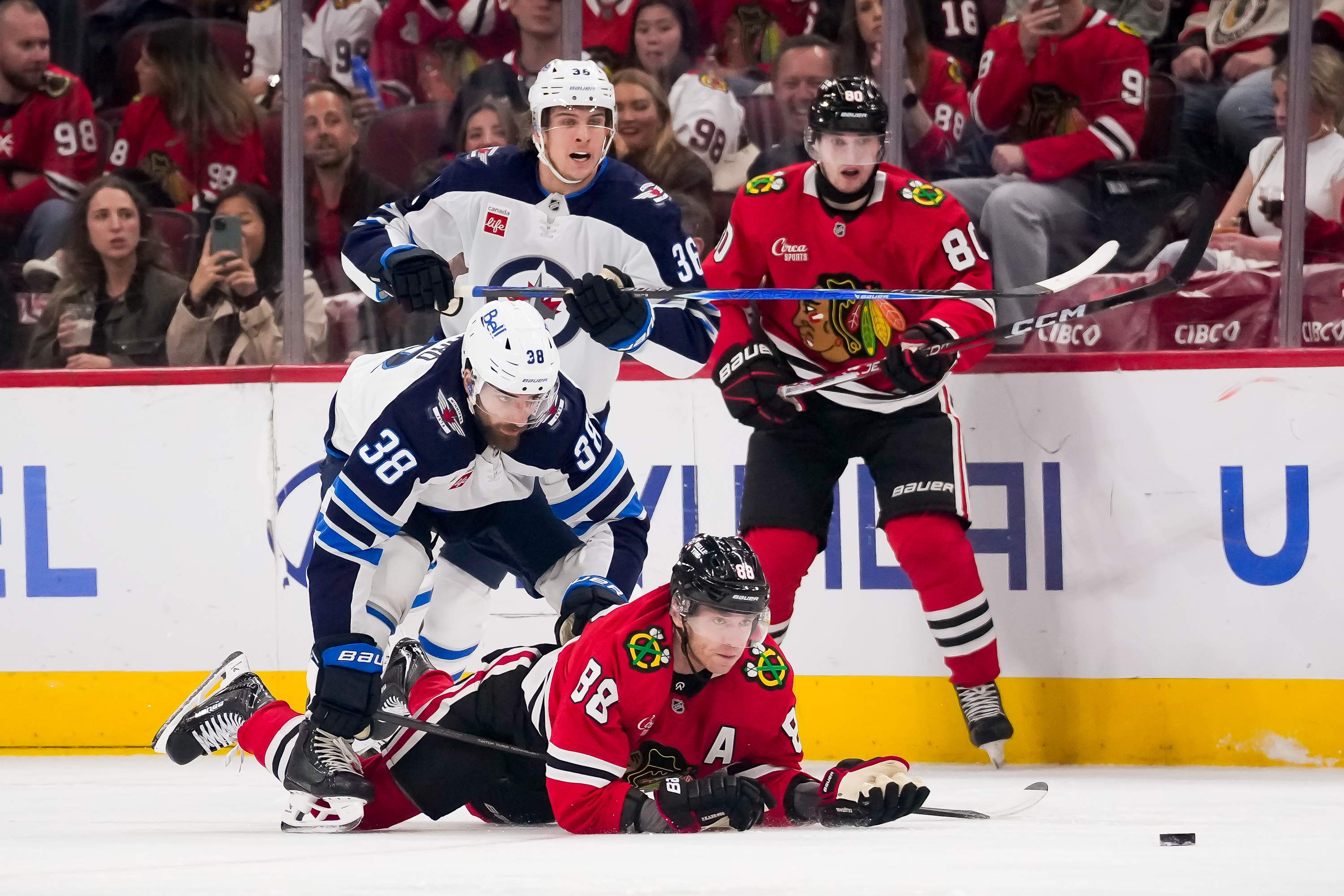 Winnipeg Jets rally from two goals down before losing in overtime 4-3 in Chicago