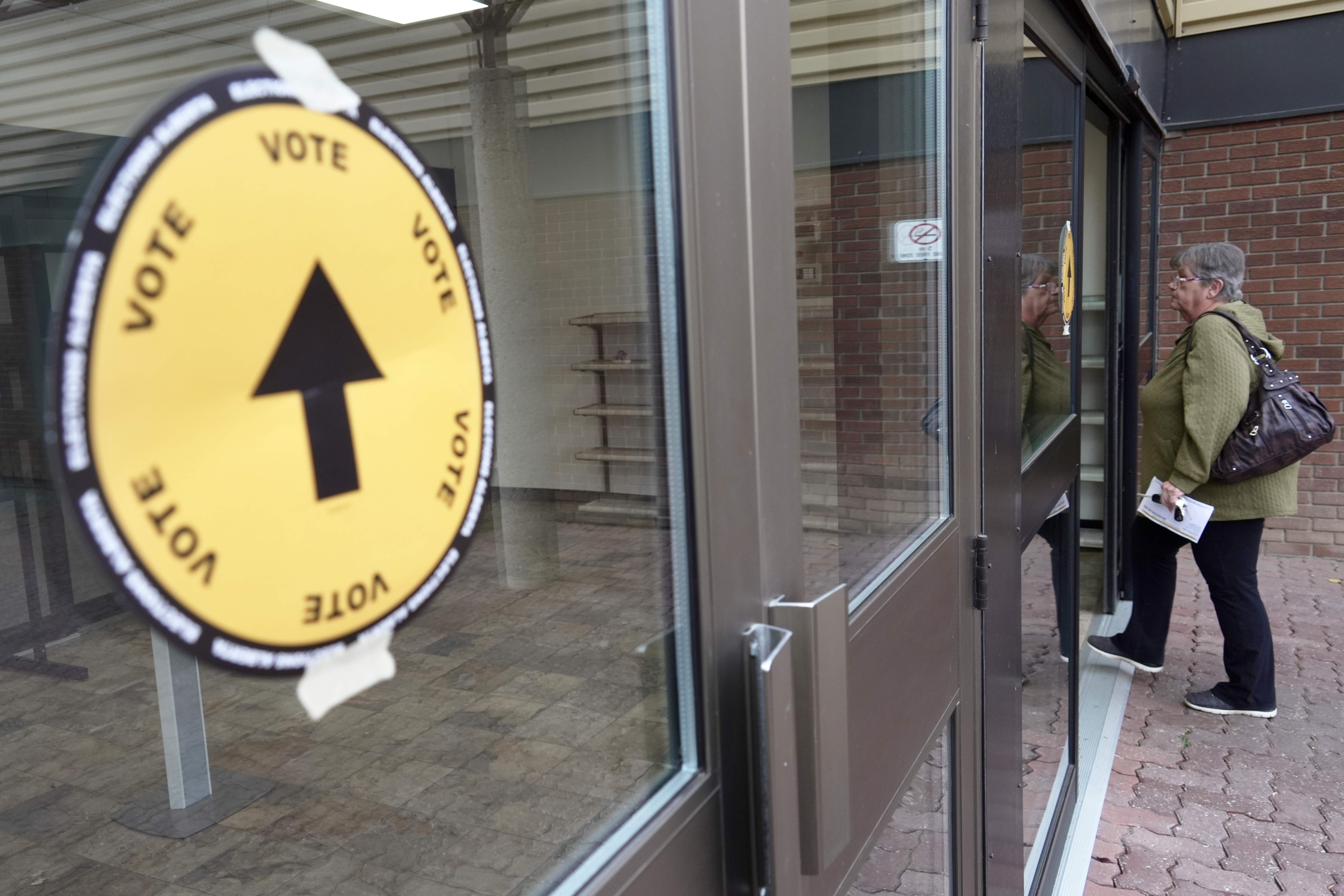 Alberta voting locations extend hours after late openings, delaying referendum results