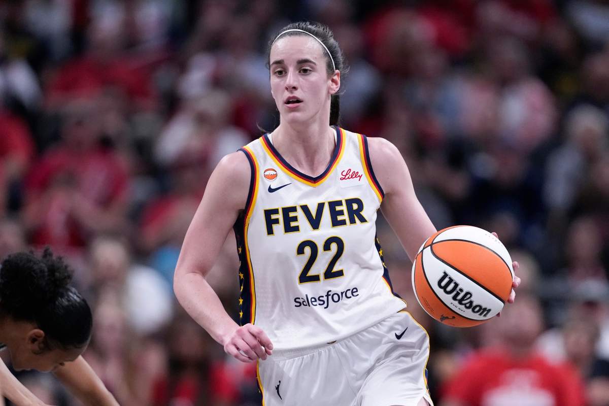 Indiana Fever guard Caitlin Clark (22) plays against the New York Liberty in the second half of a WNBA basketball game in Indianapolis, Tuesday, Aug. 11, 2026. (AP Photo/Michael Conroy)