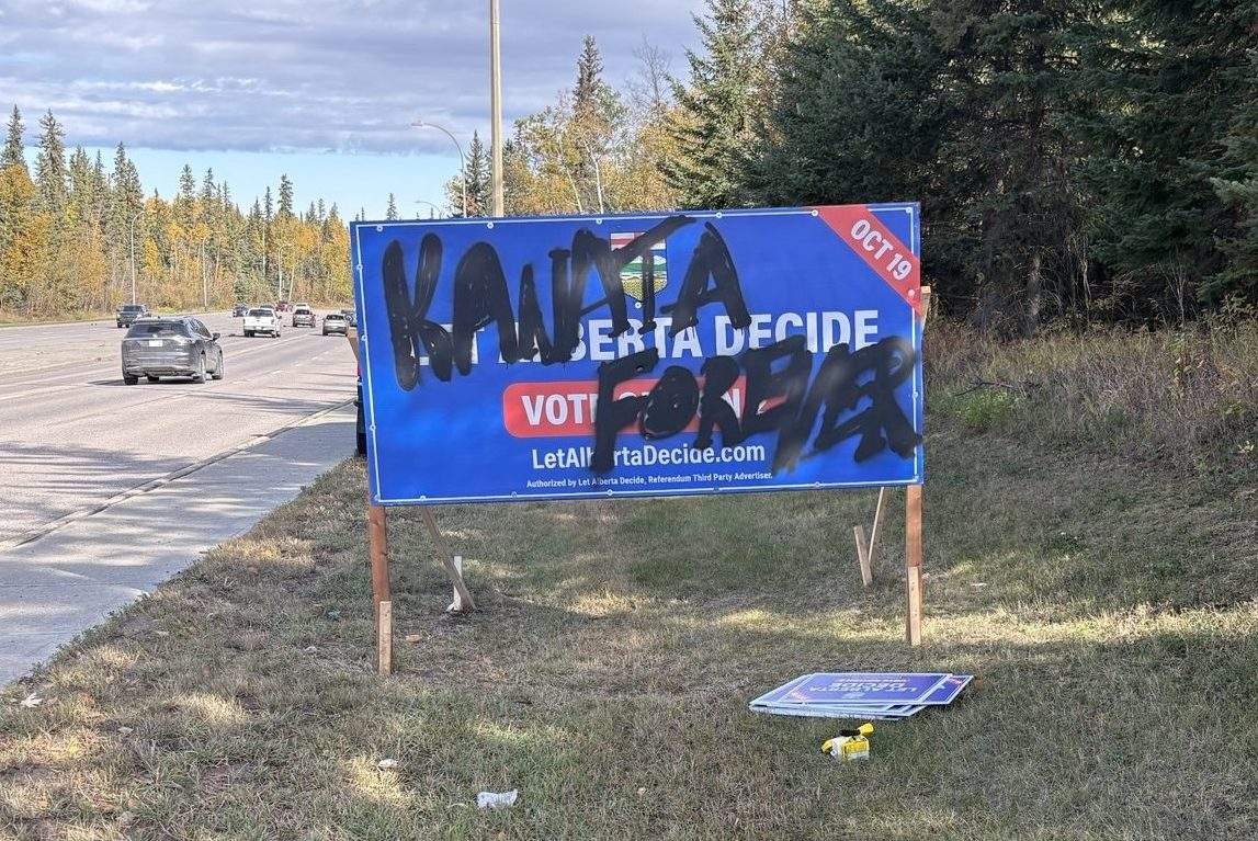 One of the seven signs promoting Alberta voting for a second referendum to leave Canada that RCMP say were were vandalized in Fort McMurray, Alta. between Sept. 29 and Oct. 4, 2026.