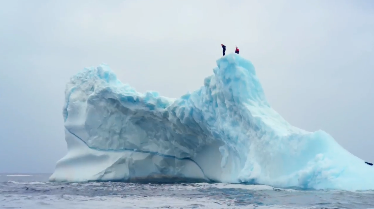 Montreal-based cliff diver Molly Carlson climbs an iceberg off the coast of Twillingate, Newfoundland, before her historic dive into the North Atlantic Ocean in June.