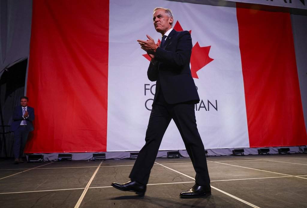 Prime Minister Mark Carney leaves the stage after speaking at a Forever Canadian rally in Calgary, Thursday, Oct. 15, 2026.
