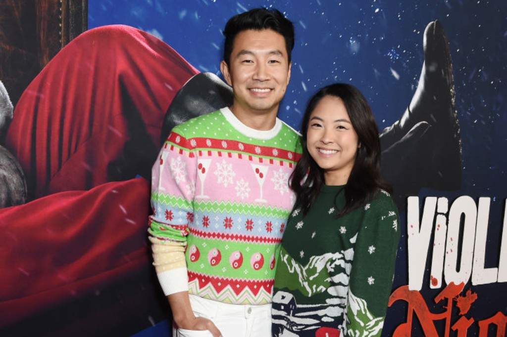 Simu Liu and Allison Hsu at the premiere of 'Violent Night' held at TCL Chinese Theatre on November 29, 2022 in Los Angeles, California.