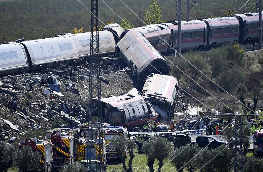 Emergency teams work at the scene of a collision involving two high-speed trains near Urda station in Toledo province, Spain, on October 28, 2026.
